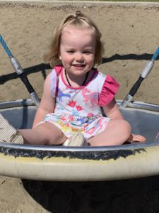 toddler on swing